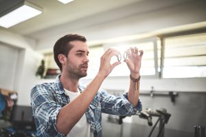 Mechanic in bicycle store